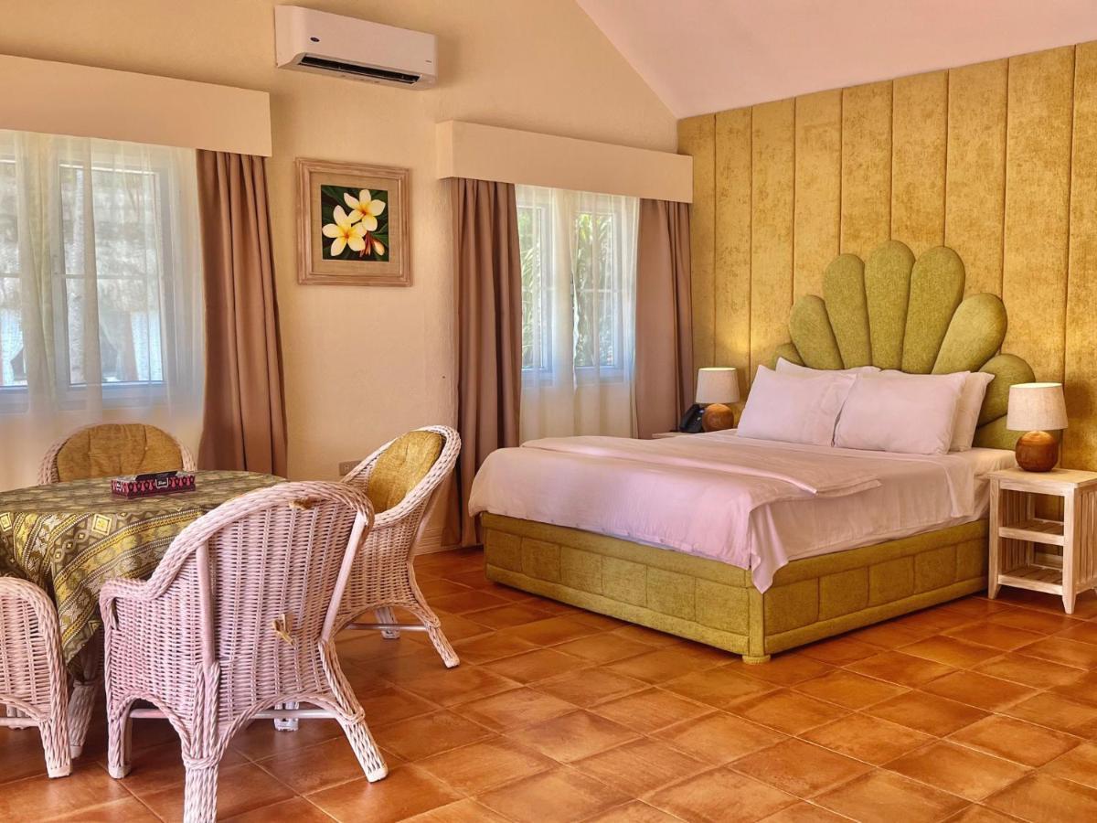 Coco Grove Beach Resort, Siquijor Island Exterior foto A room at the hotel
